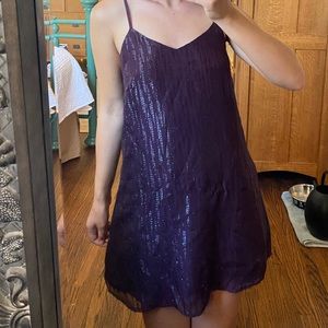 Adorable purple shiny dress by the brand Miami!